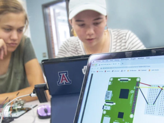 students working at a computer