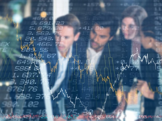 People analyzing stock prices.